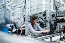 Woman using manufacturing software.