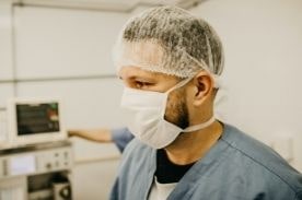 medical assistant wearing face mask.