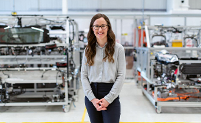 Woman in manufacturing facility.