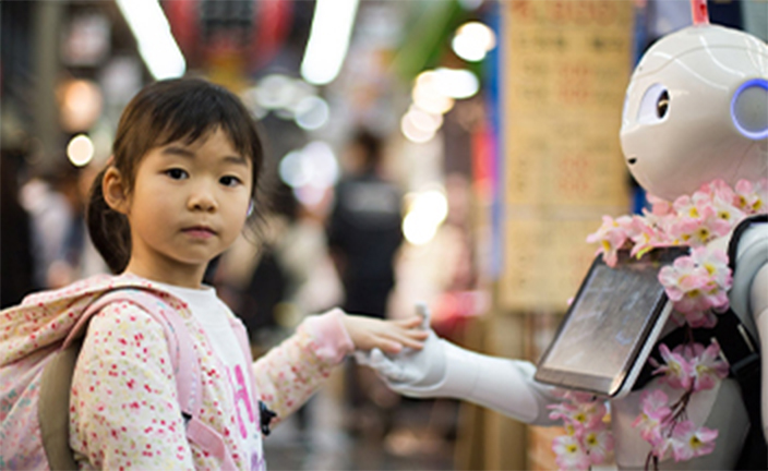 Girl playing with robot.
