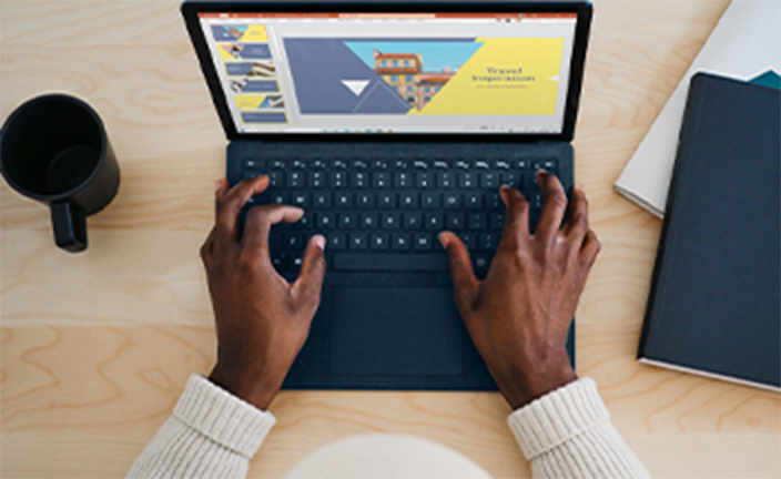 Man using laptop computer.