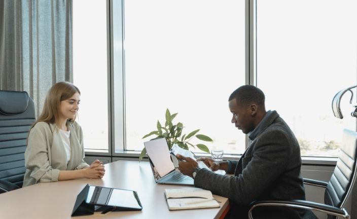 man and woman in job interview.