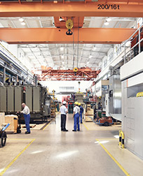 Manufacturing employees working within a warehouse.