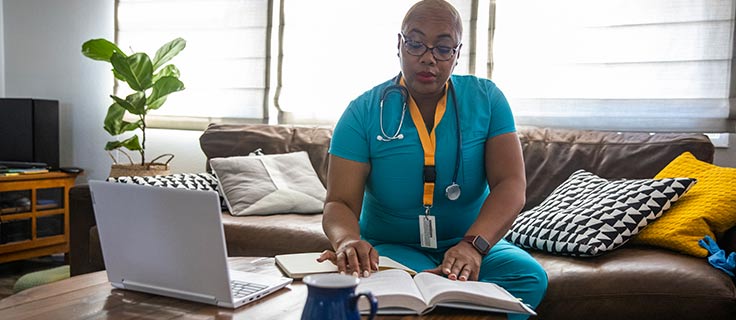 Healthcare worker studying.