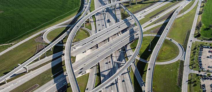 A Highway Interchange with multiple lanes and exits.