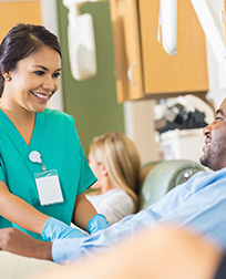 medical professional assisting a patient.